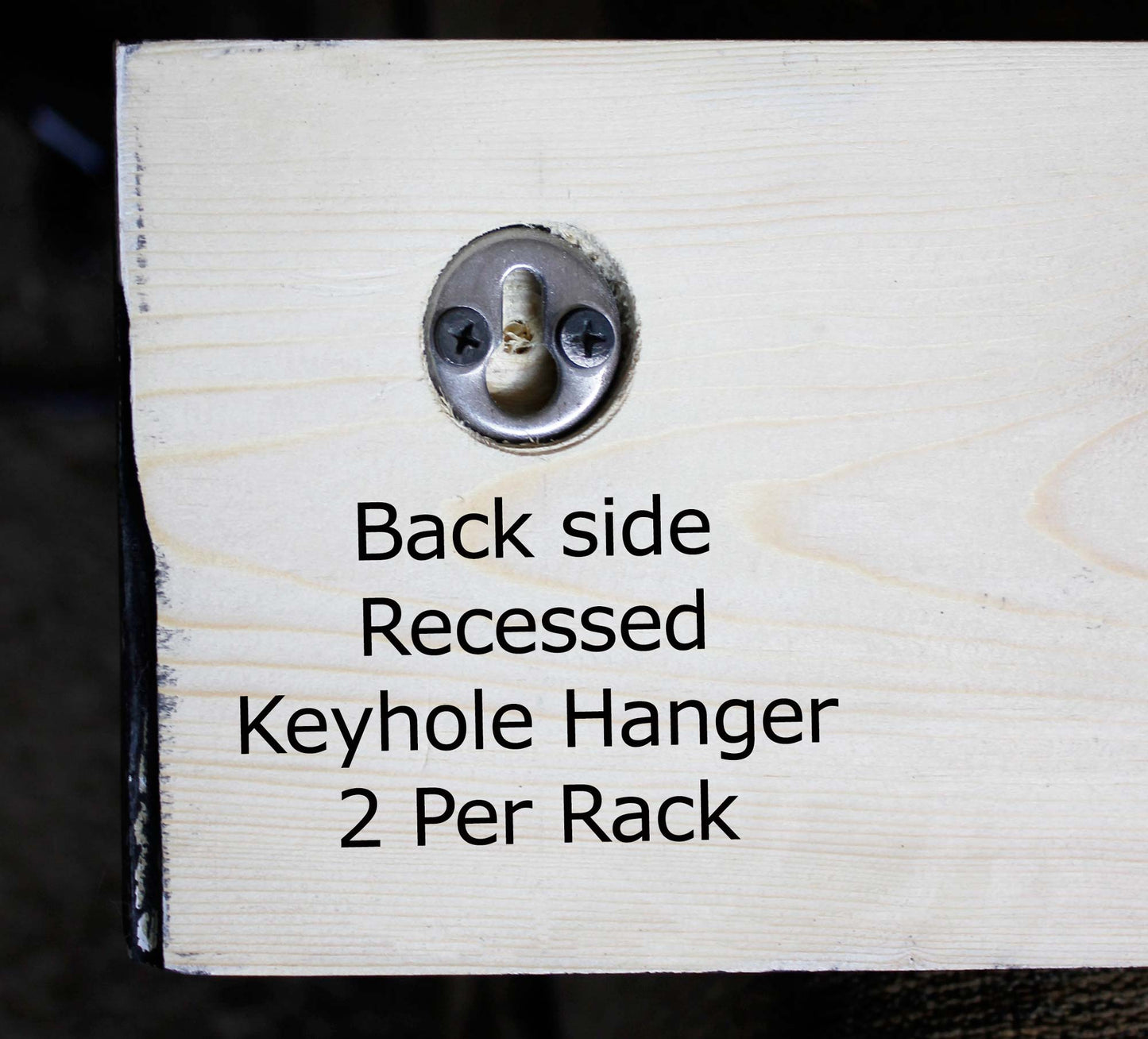 recessed keyhole hangers that are on the back of the wooden coat rack