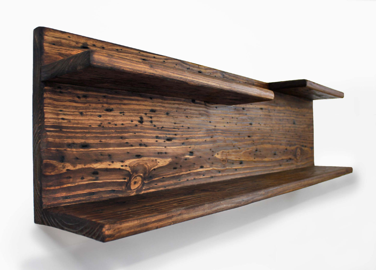 side view of the split level shelf wall mounted display rack hand weathered reclaimed wood look for those who love western decor, it has a masculine rustic style making it a great gift for him or a vintage country housewarming present, perfect for displaying sports collectibles - baseball, football, rugby, soccer, lacross, awards, trophies, antiques, plants, gaming systems and vintage items | beautifully handmade in USA
