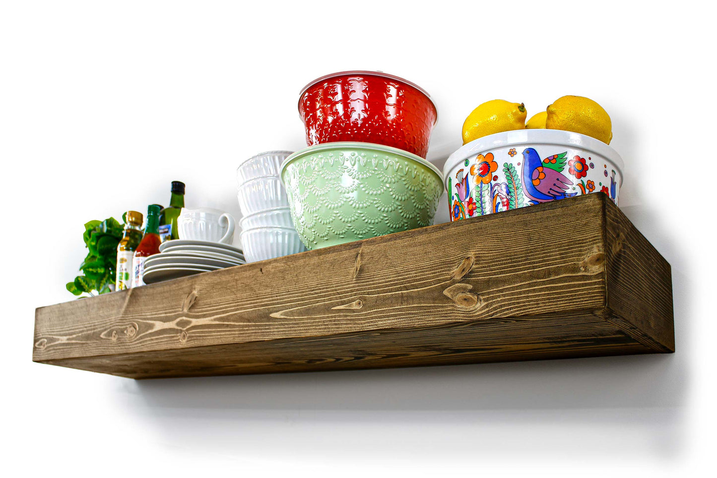 kitchen floathing Wooden shelf large thick timber beam style with various cooking items including bowls and lemons on a white background