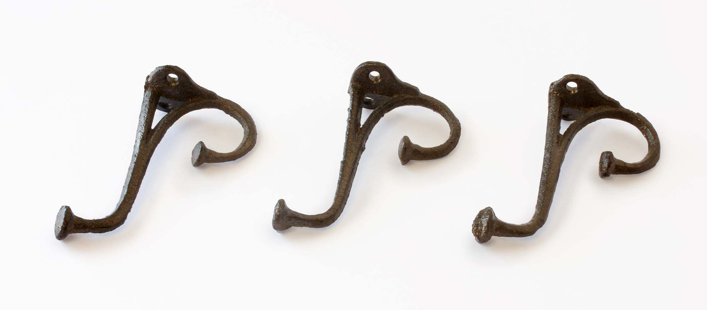 Antique vibe nailhead wall hooks are cast iron but look like old time hand forged hooks from nails just like craftsmen used to do it working with their resources. The texture has a grainy granular appearance from the Cast Iron sand-cast texture however the texture won't snag clothing. The hooks have 2 holes to screw into a wall or back board. Perfect for DIY hanging coat rack projects with a country farmhouse decor in a home or office.