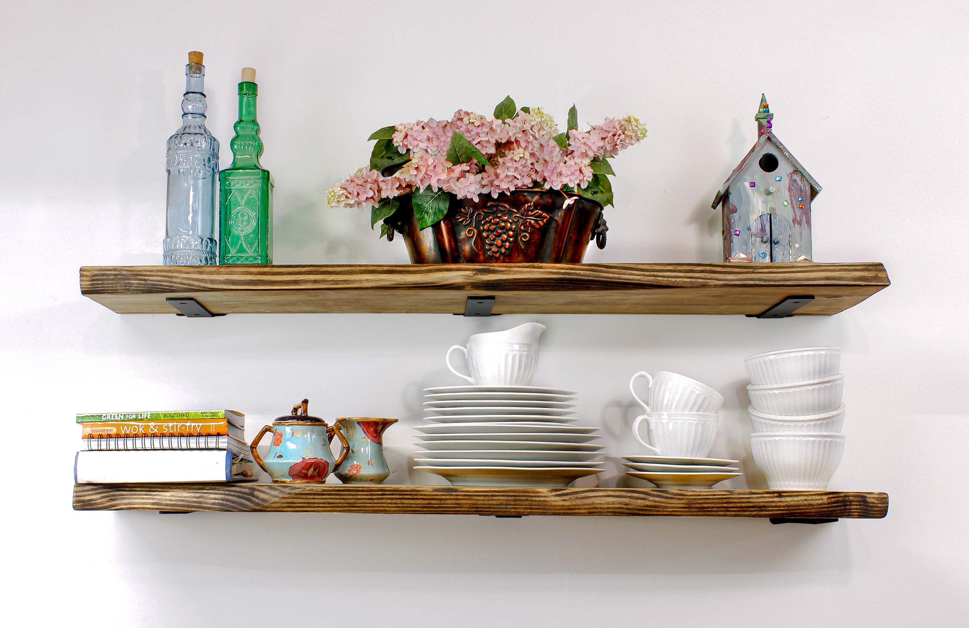Wall Shelf Rustic Farmhouse Wood Shelves Hand Carved Live Edge large wide wood shelves with metal brackets heavy duty to display larger items  in a country farmhouse home decor natural live edge shelves really pretty in a kitchen or dining room for dishes, antiques, memorabilia, photos, pictures, family heirlooms, and precious keepsakes. Pretty in a kitchen above the cabinets to display tea cup and kettle sets, dishes and even pots and pans