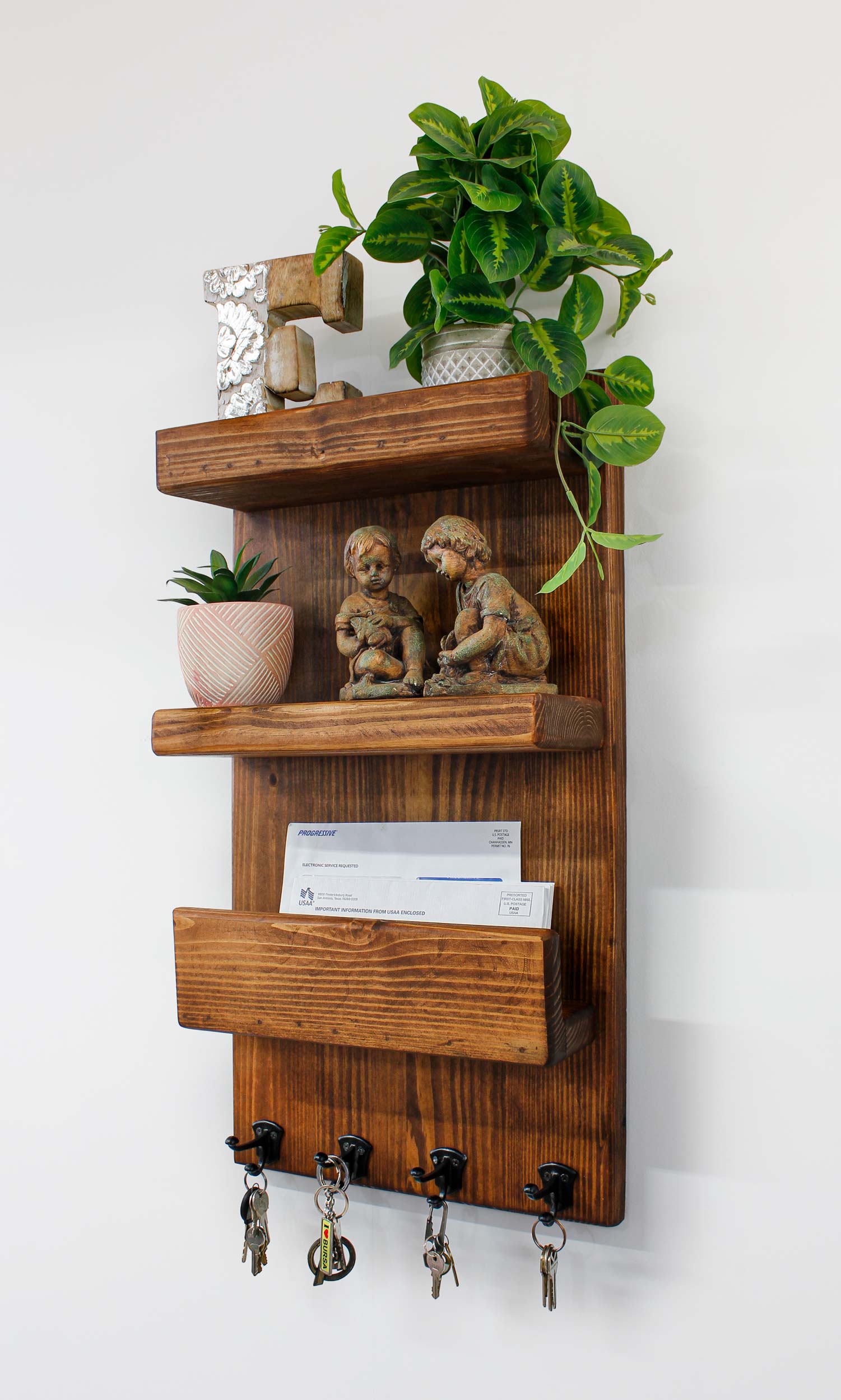 tall narrow mail holder and key hooks to key your necessities like keys, mail, leashes, scarves, baseball caps, and anything with a strap or handle conveniently stored by the front door. The handmade wall mounted key hanger and mail organizer makes a great wedding gift for housewarming present for those who love quality handcrafted gifts. The solid sturdy constructions means it will last for a lifetime of use. Easy to hang as it comes with hardware, hanging instructions and hanging template.