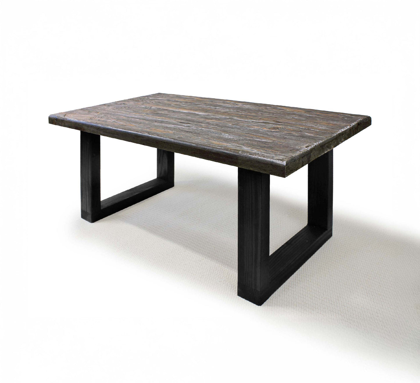 Rectangular wooden table with black legs on a white background