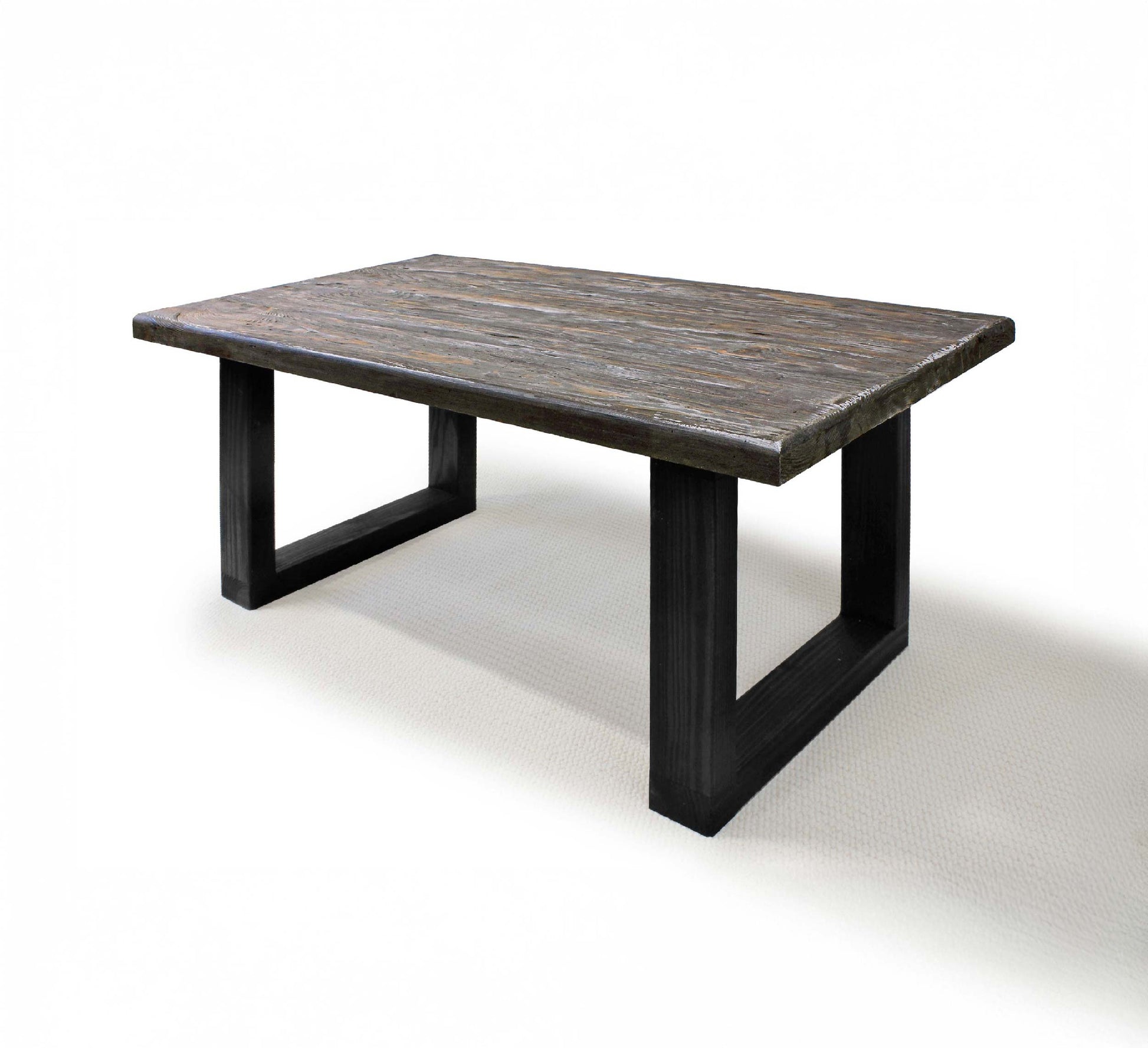 Rectangular wooden table with black legs on a white background