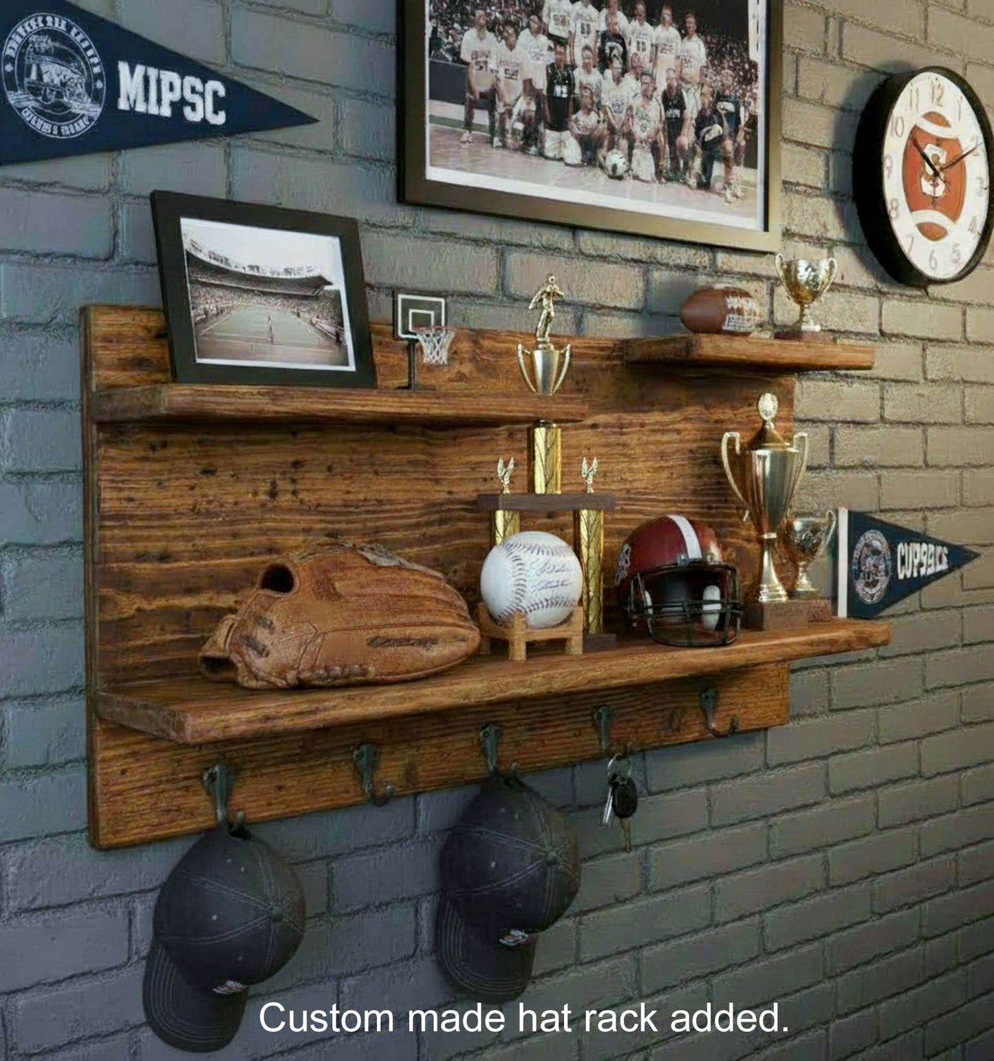Man cave Wooden shelf with sports memorabilia against a brick wall.