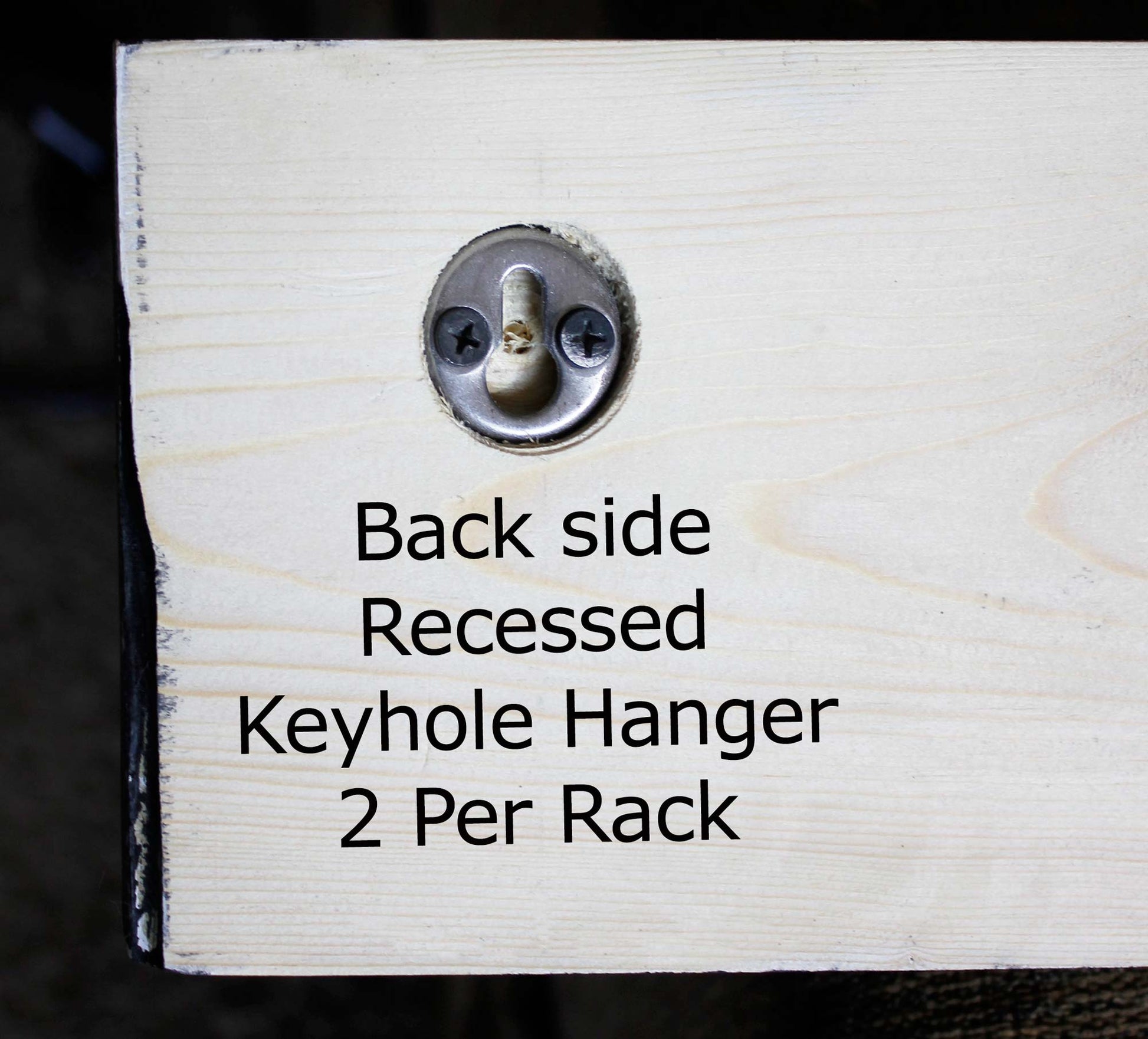 recessed keyhole hangers that are on the back of the wooden coat rack