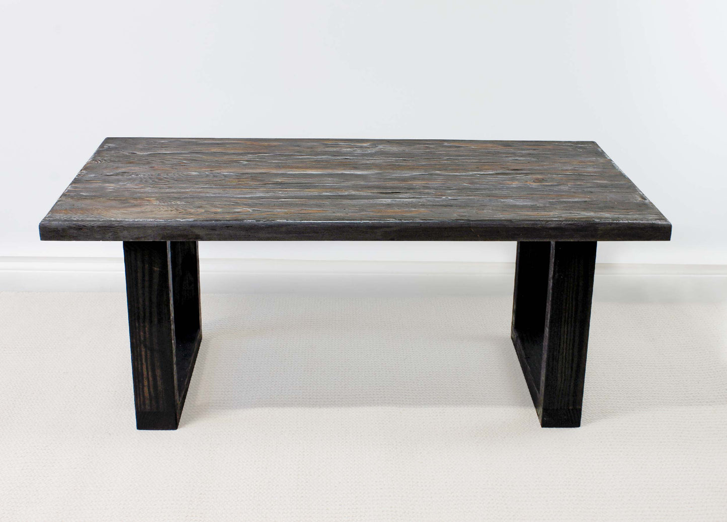 Dark wooden table on a white background