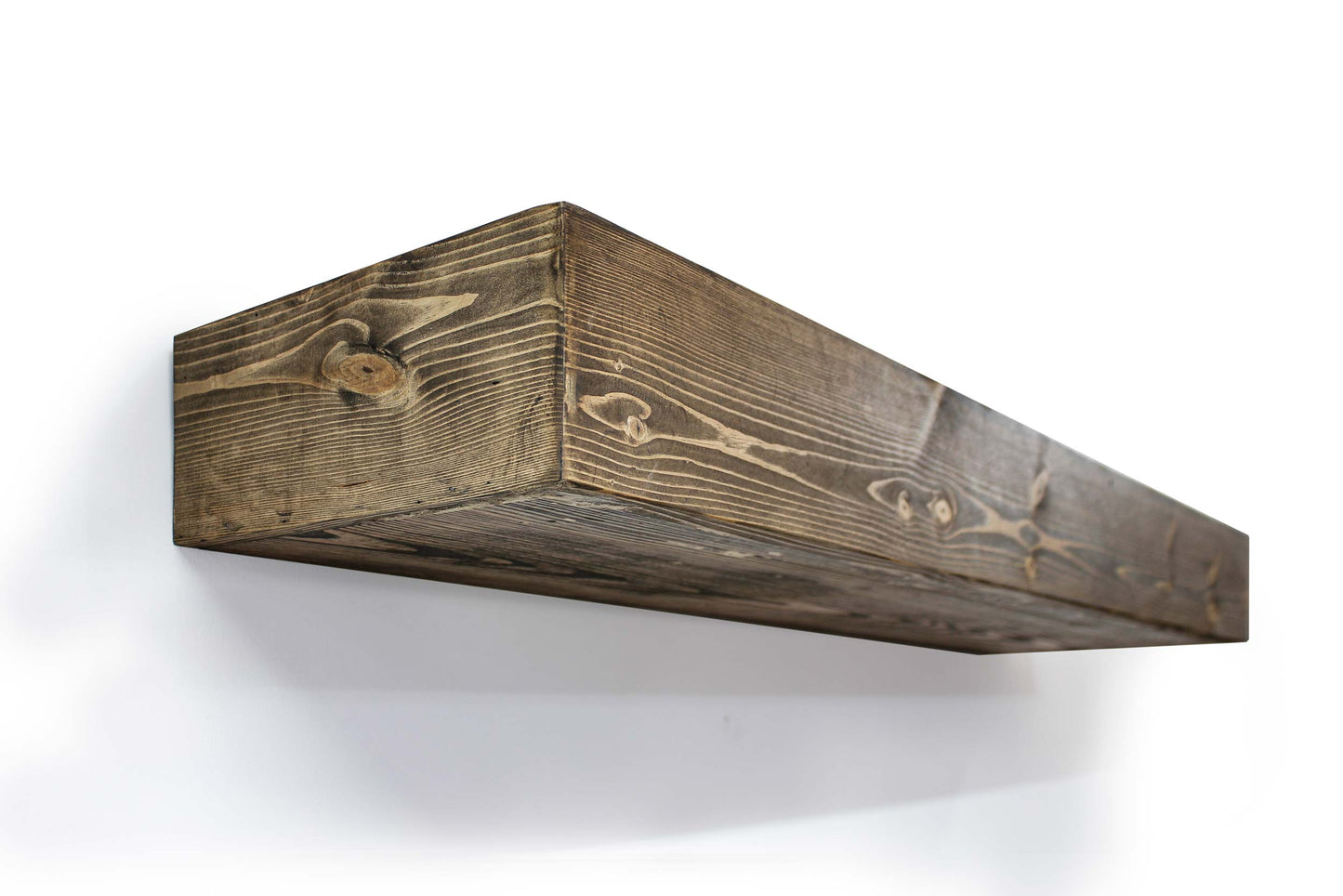 rustic Handmade solid wood 5" x 10" shelves look like timber beams but are hollow inside (makes it light weight) which slides over a dental insert in the back to secure it to the wall studs - see the video for demo. The mantelpiece wooden shelf comes in a variety of colors from the stained pine wood or we can custom make the size, finish and color to match your decor. You can order color samples to see the color for a perfect match however each tree is different and the wood stain will vary