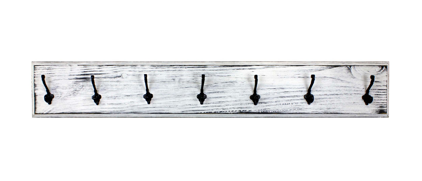 Rustic farmhouse wall coat rack mounted in entryway holding coats and hats. Decorative and functional wall hook rack with heavy-duty metal hooks. Adds charm and practical storage to mudrooms, hallways, or front door areas.